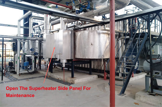 Open the superheater side panel for maintenance
